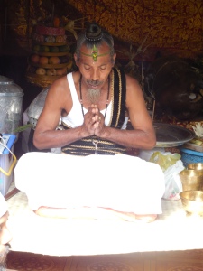 Holy Man Meditating in Preparation for the Ceremony